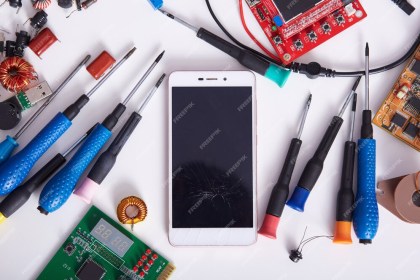 smartphone-motherboards-tools-laying-white-back-table-radiotrician-workspace-computer-hardware-mobile-phone_176532-2468